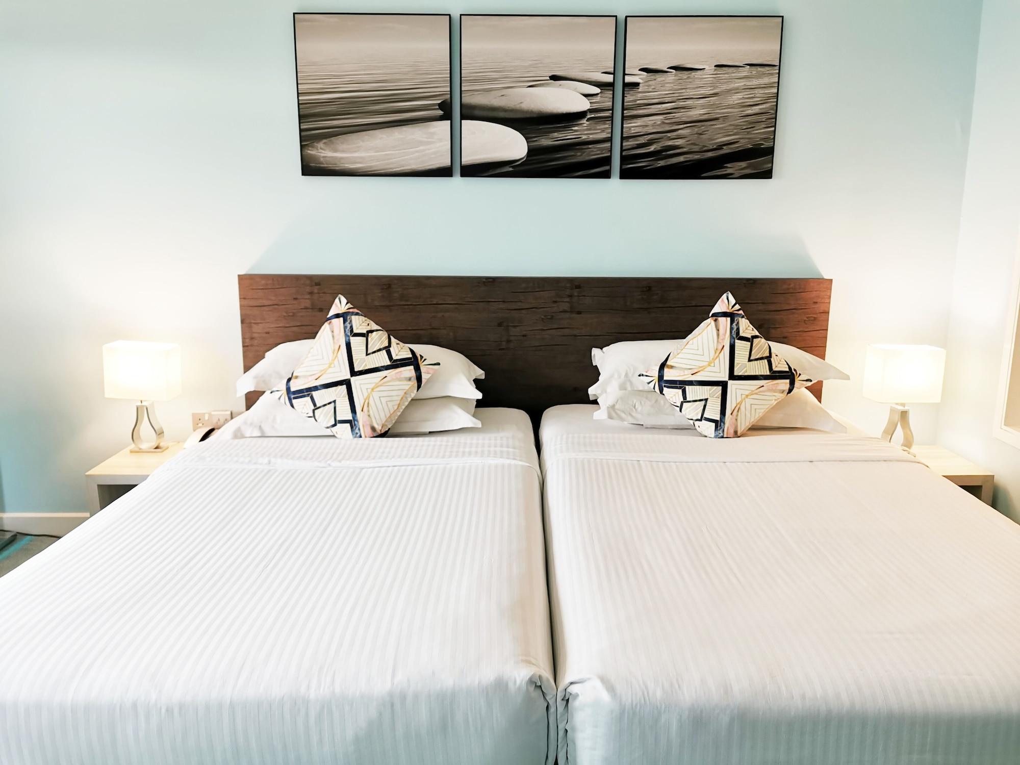 Thistle Johor Bahru Exterior photo A bedroom at the hotel