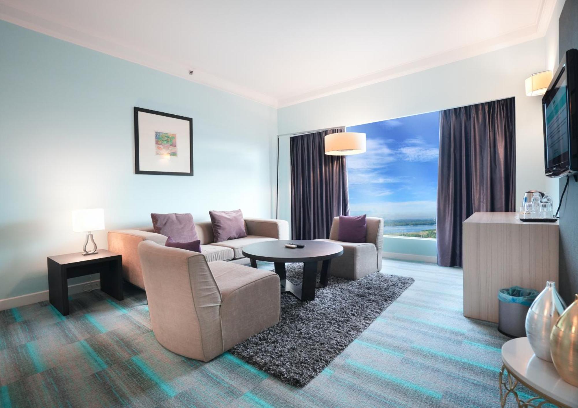 Thistle Johor Bahru Exterior photo Living room of a suite