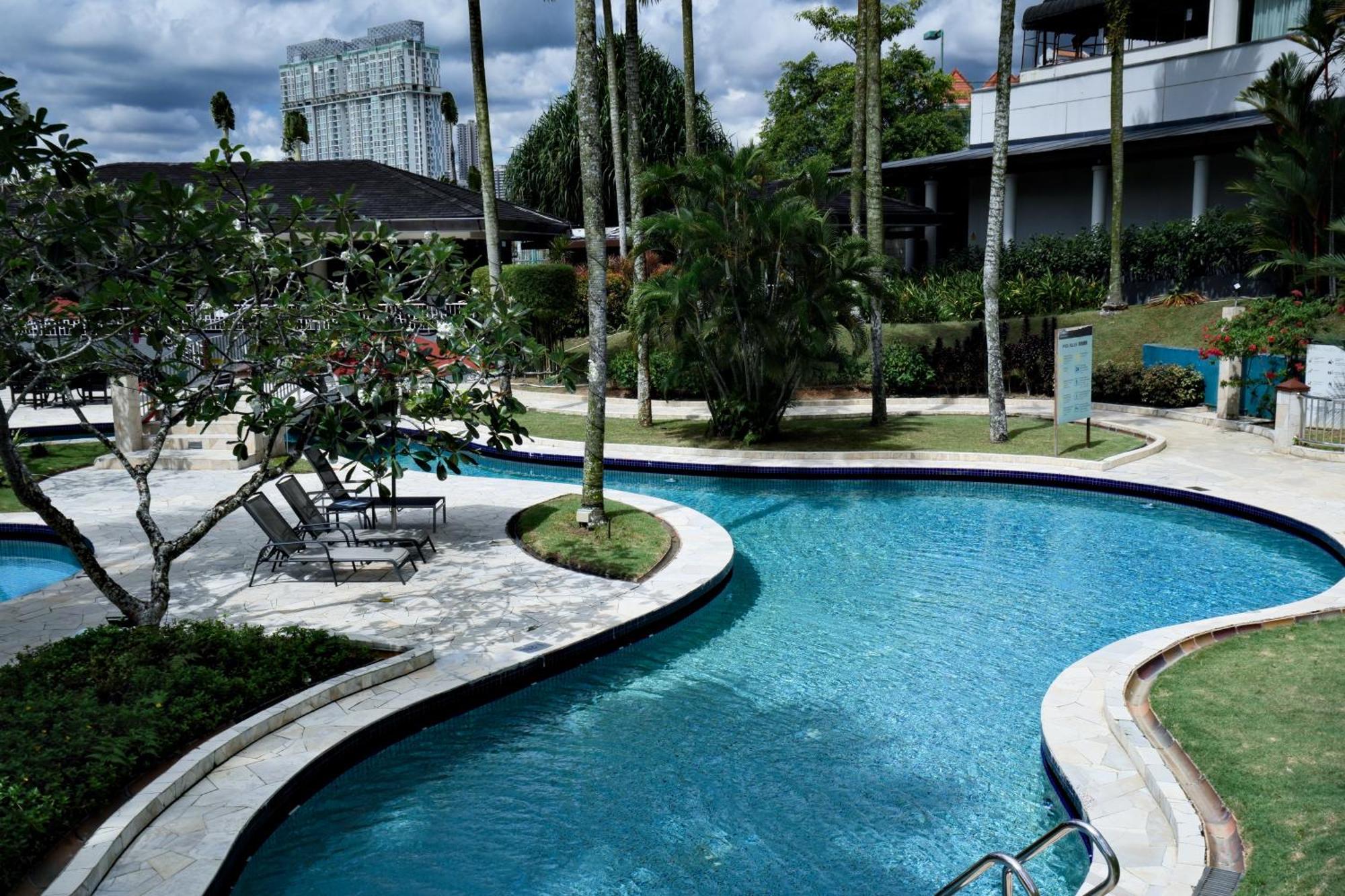 Thistle Johor Bahru Exterior photo The pool at the resort